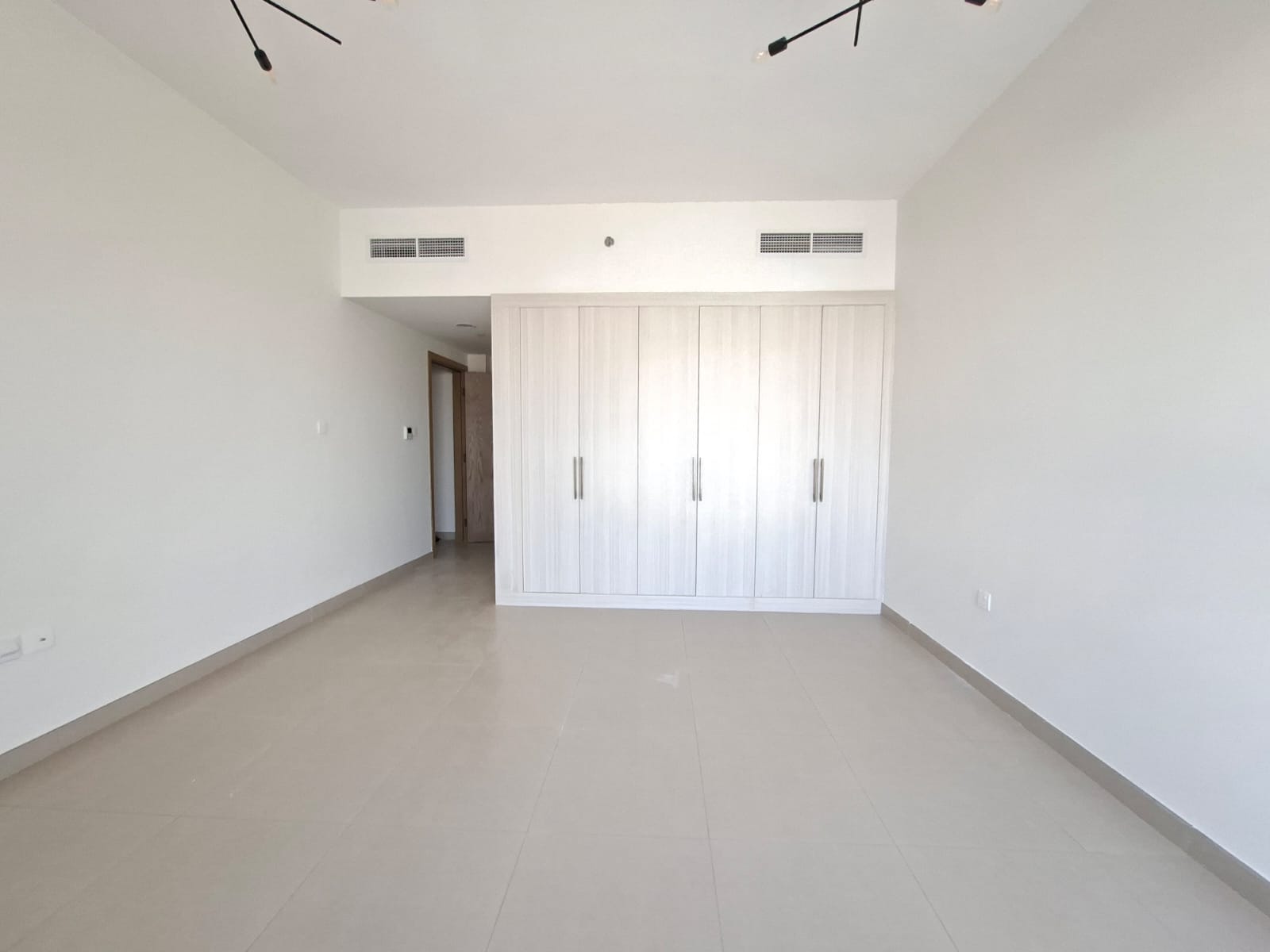 Brand new Building 2bhk apartment with maid room wardrobe covered parking