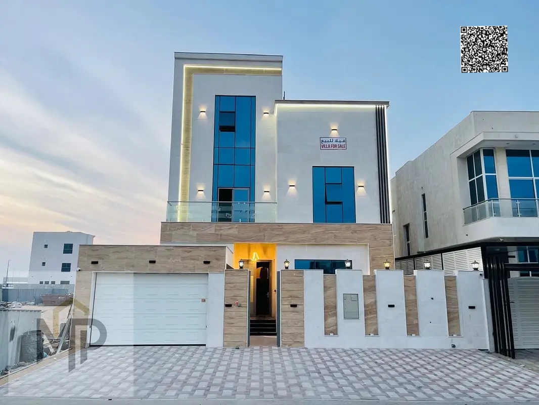 A villa with a price including registration and ownership fees on the main street, ready to live in, in the most prestigious areas of Ajman. Freehold