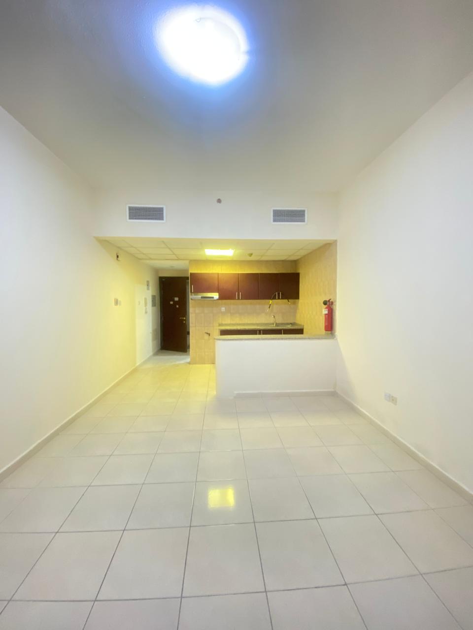 **HOT OFFER*** ** Spacious *STUDIO* with BALCONY Just in 23K Close to Dubai Exit FOR MORE INFORMATION CALL NAEEM**