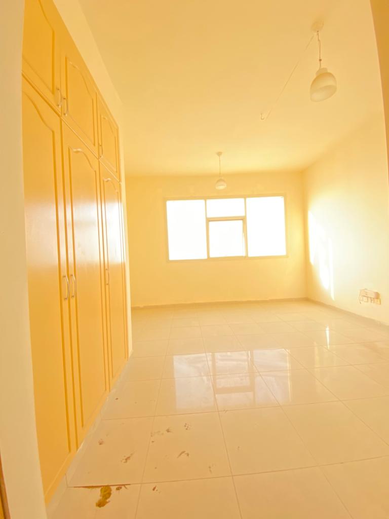 LIMITED OFFER!! AMPLE STUDIO AVAILABLE WITH BUILT-IN WARDROBES IN A FULLY FAMILY BUILDING JUST IN 26K,AL NAHDA SHARJAH