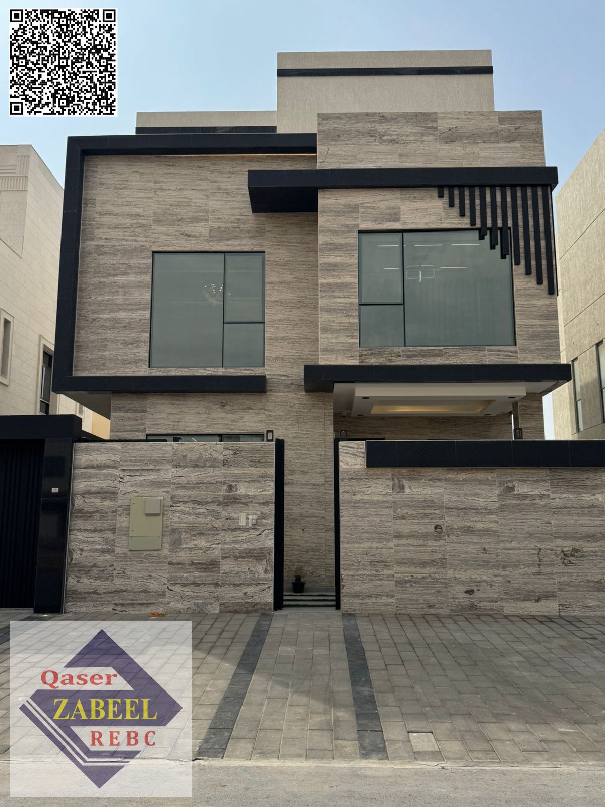 Luxury villa for sale with a swimming pool in Ajman Al Yasmin, including registration fees and central air conditioning.