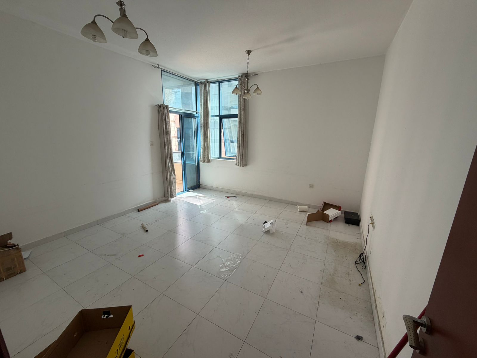 Master bedroom and living room - Falcon Towers Ajman - Family accommodation - Central air conditioning - Free parking - Free maintenance