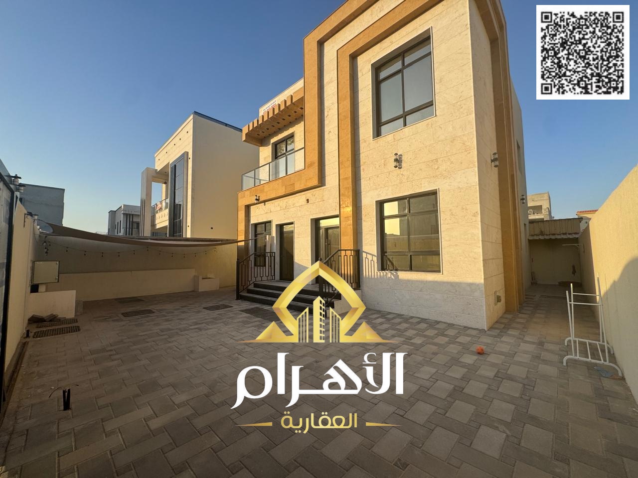 Villa for sale in Ajman, Al Zahia, at a bargain price, including electricity, water, and air conditioning.