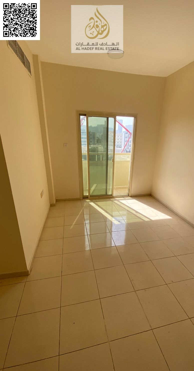 A well-designed two-bedroom apartment with living room, two bathrooms, and a balcony is available for annual rent in Al Rashidiya 2 – Ajman, located n