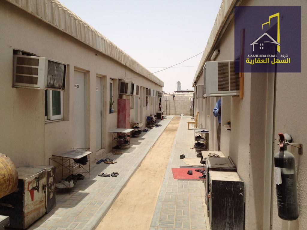 Workers' accommodation for sale in Al Sajaa area with a 12% return. The accommodation is clean and tidy.