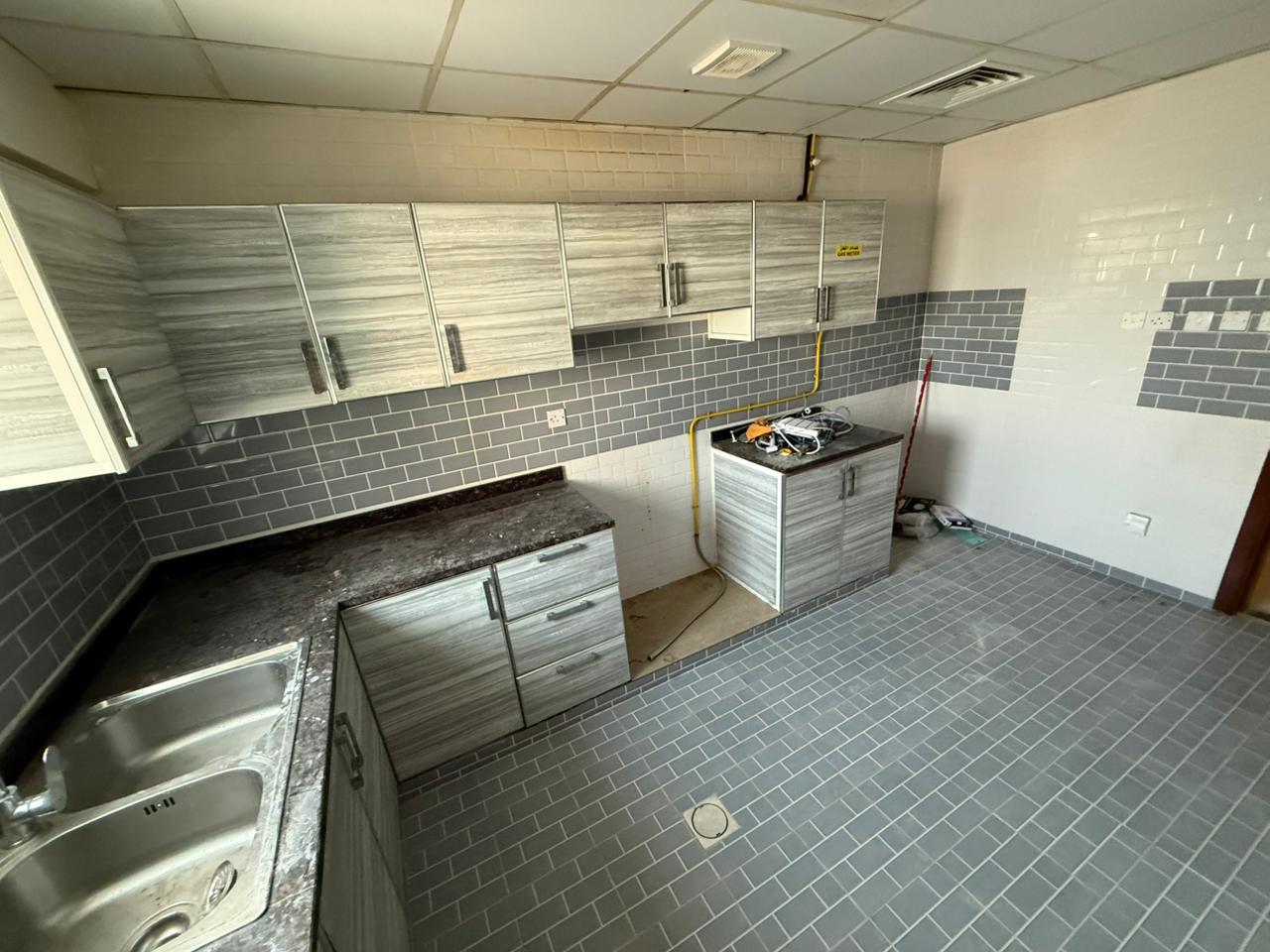 Three-bedroom apartment with living room in Al Jurf 2, close to Ajman Court and Ajman University On Sheikh Ammar Street 3 bathrooms with balcony Cent