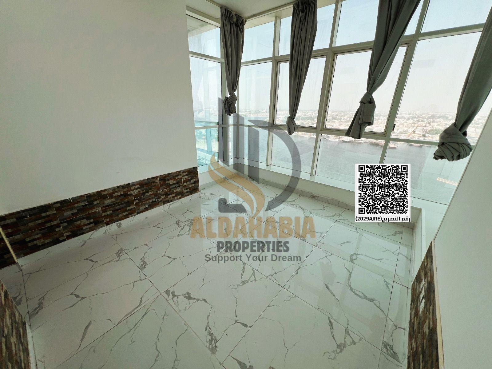 For Sale – 2 Bedrooms + Living Room with Open View of Ajman Creek
