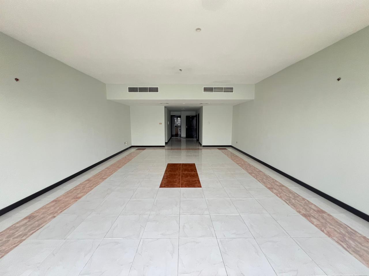 Air conditioning, owner-owned gym, swimming pool, sauna, and lockers.