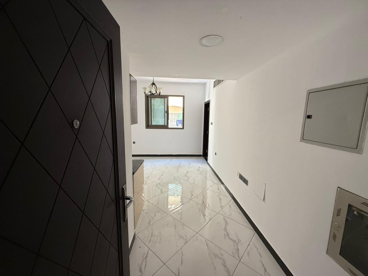 Studio apartment for annual rent in Al Jurf 2, Ajman, in a prime location and close to the National School.