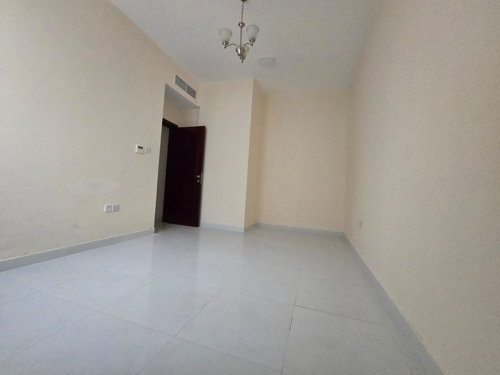 1 bedroom apartment in Al Aalia near Mohammed Bin Zayed exit, new building, card access, central AC, families only, 30,000 in 4 payments