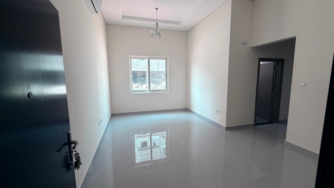 1 bedroom first tenant in Al Rawda near Kanz Mall and MBZ exit, split AC, families only, 33,000 in 4 payments