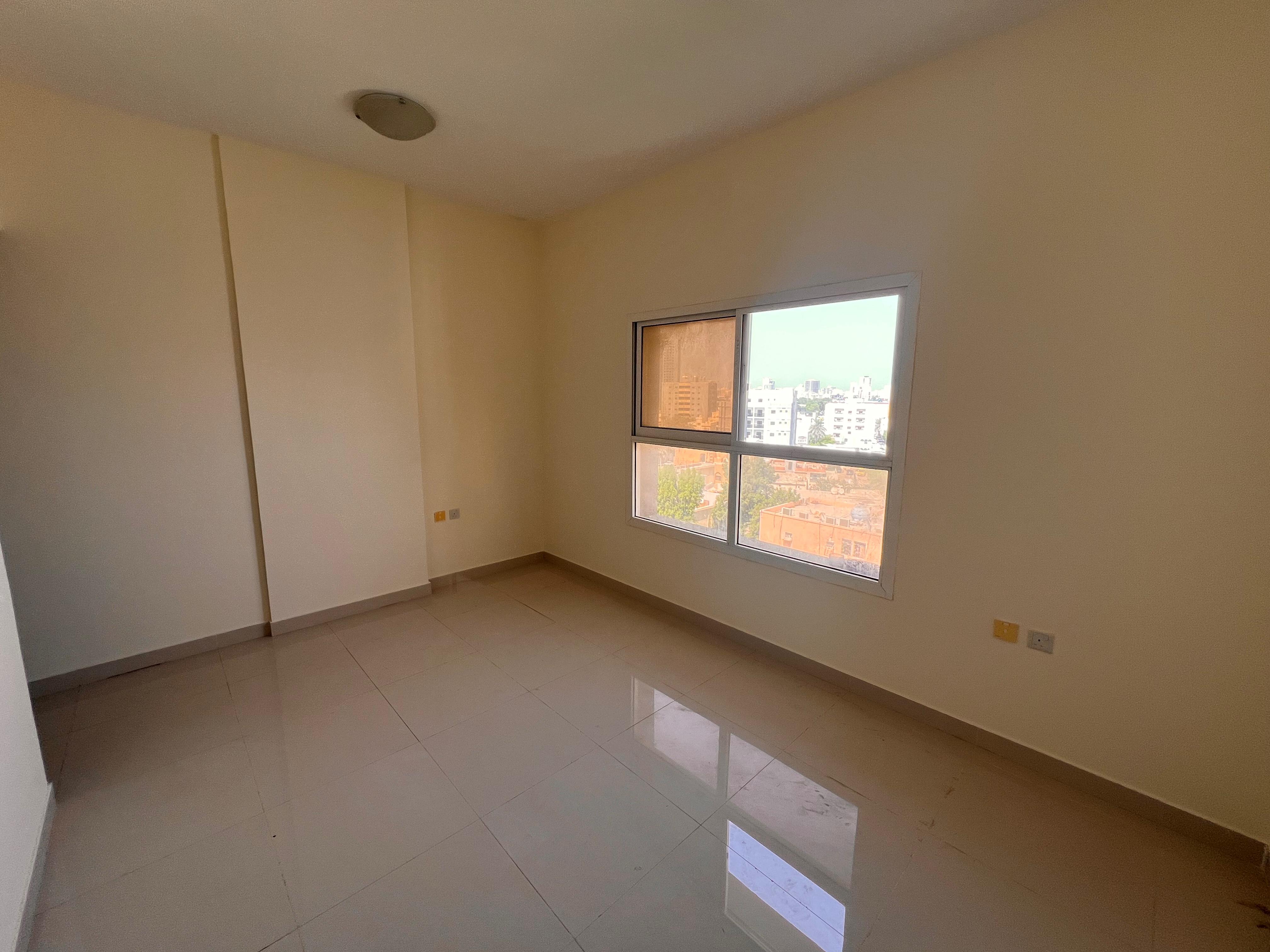 Large annual studio apartment in Al Nuaimiya, behind Al Safeer Mall. Separate kitchen. Central air conditioning.