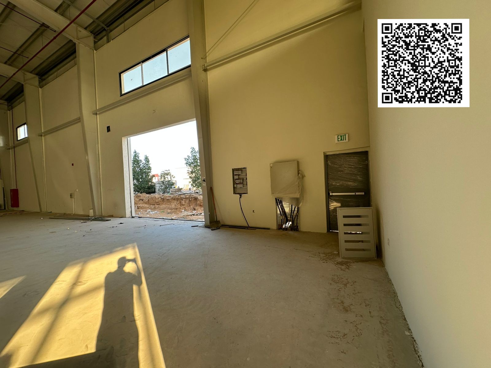 25000 Sq. ft Industrial warehouse with 2 sides mezzanine ,250 KW Electricity for Rent in Umm Al Quwain