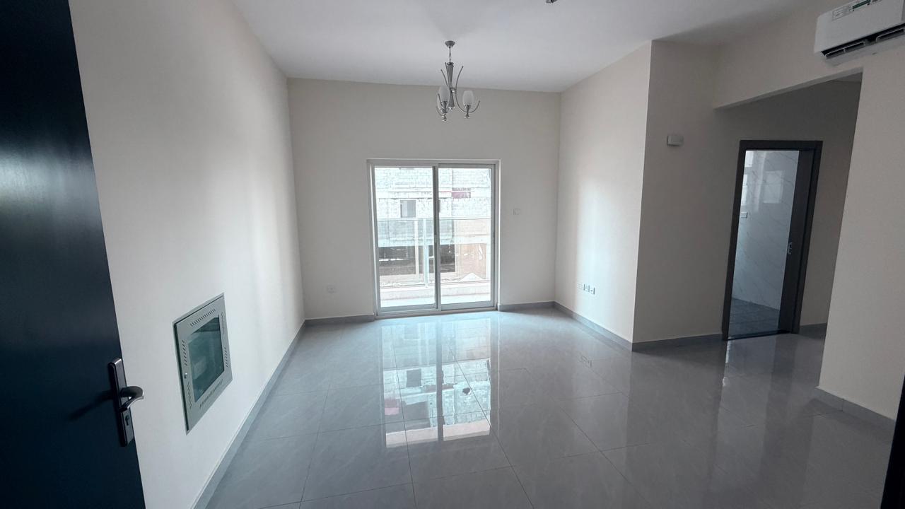 One-bedroom apartment, first occupancy, in Al Rawda, next to Kenz Mall and close to Mohammed Bin Zayed exit – family accommodation with air conditioni