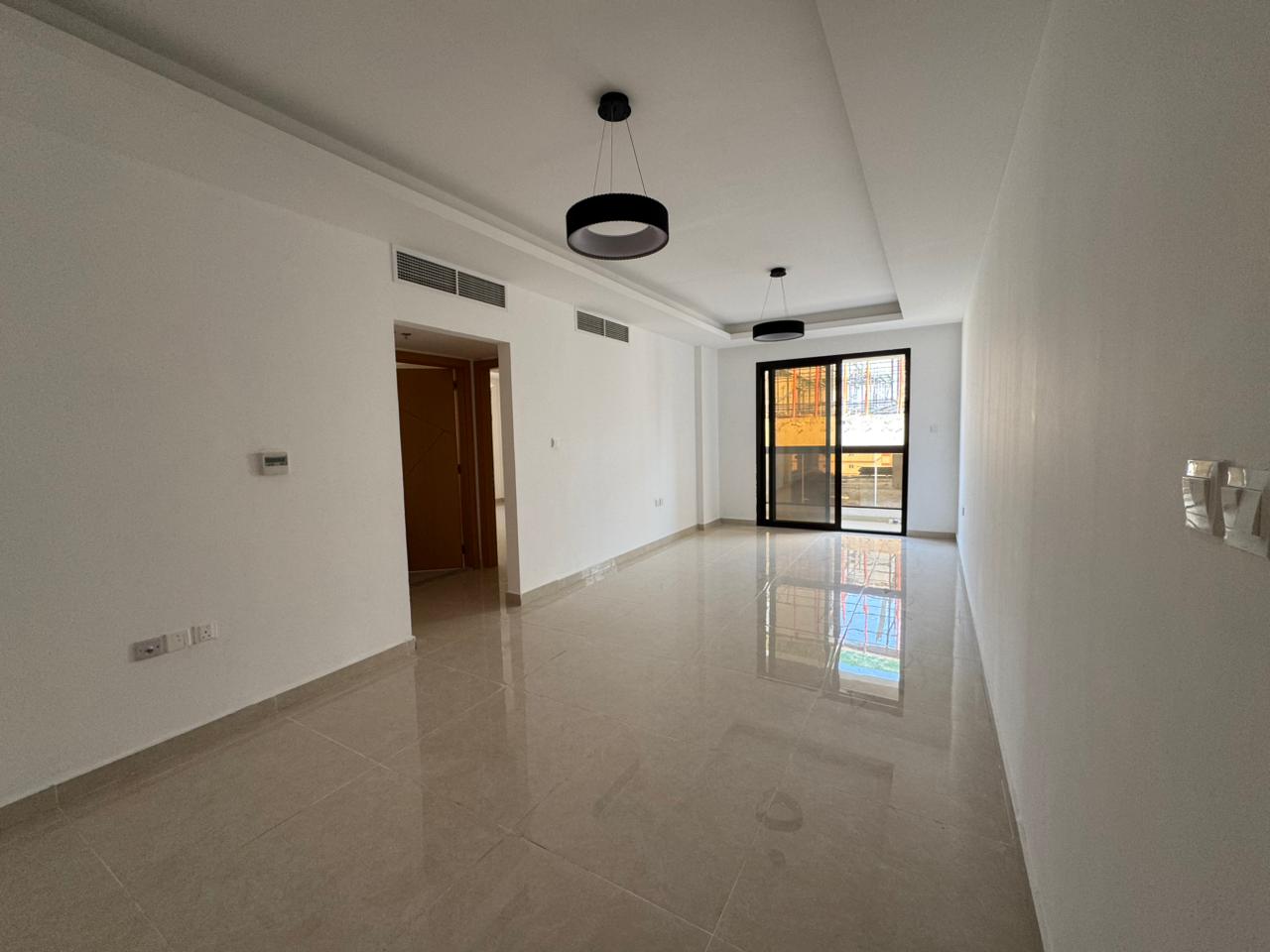 Largest 2 Master Bedrooms + Hall with Guest Bathroom – One Month Free in Al Jurf 3 A spacious apartment ideal for families, located in a vibrant area