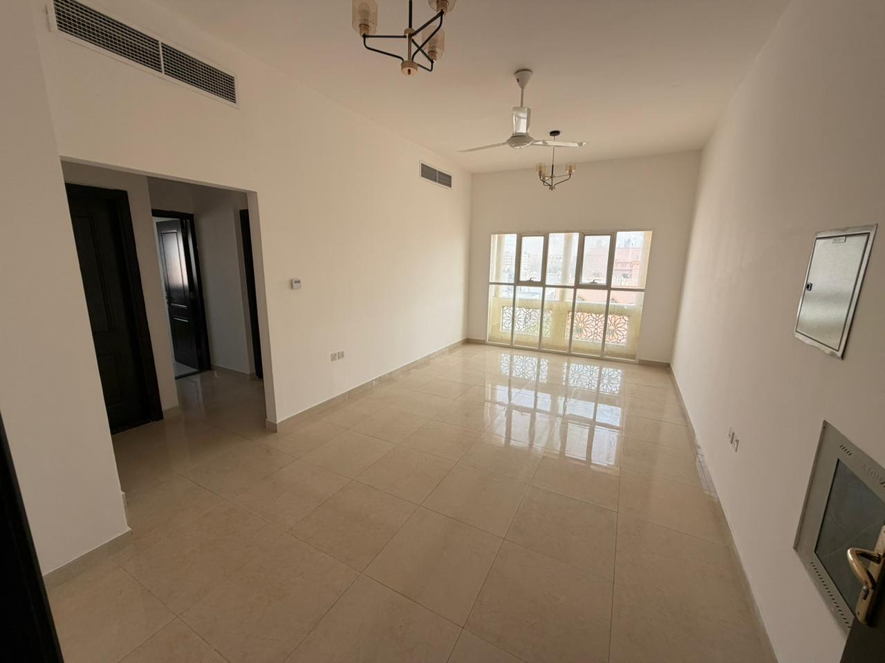 One-bedroom apartment for annual rent in Al Muwaihat 2, near Sheikh Mohammed Bin Zayed Road – 2 bathrooms, kitchen, spacious, and central air conditio
