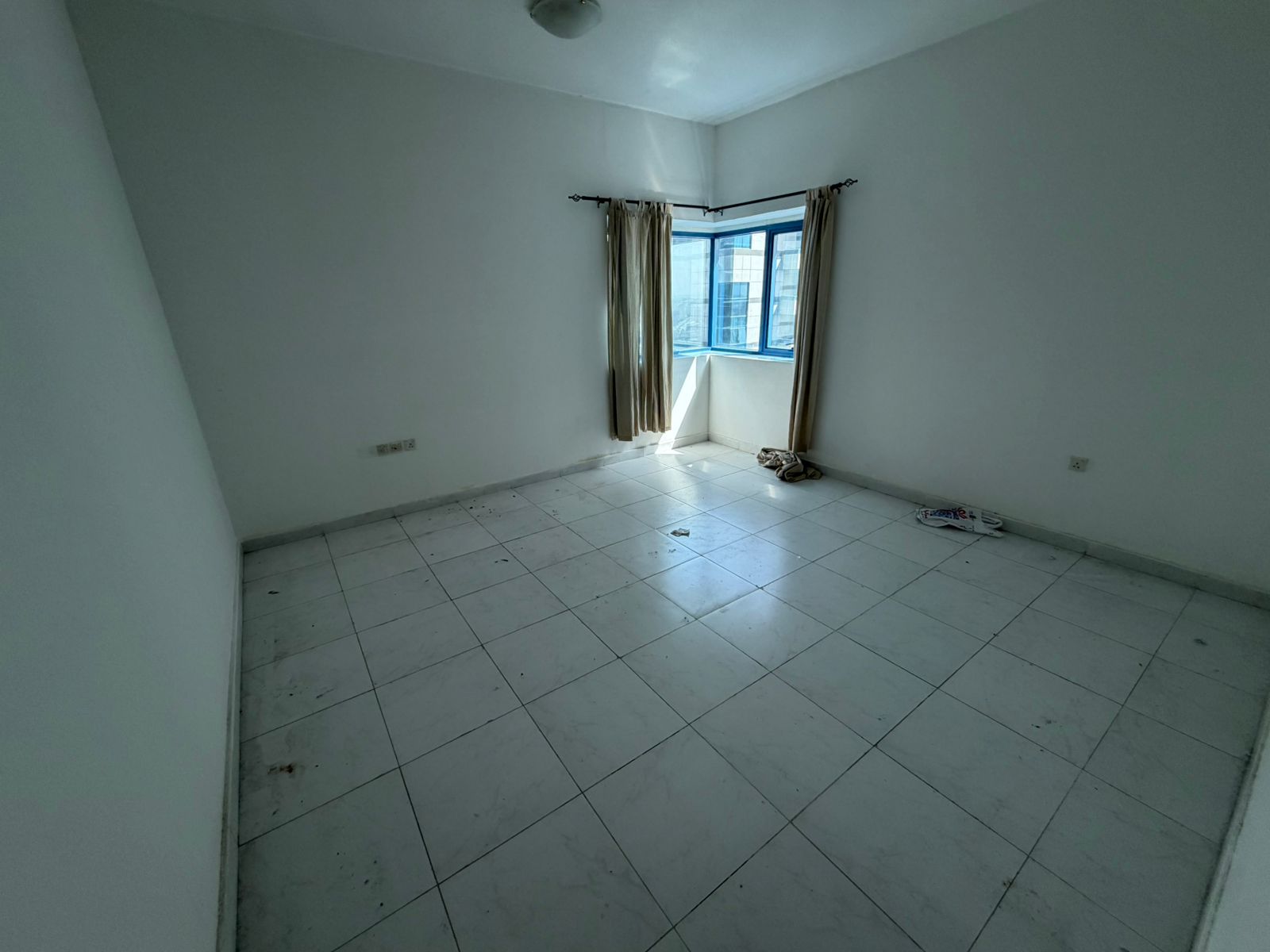 A distinctive one-bedroom apartment in Falcon Towers, Al Rashidiya, Ajman – master suite, 2 bathrooms, balcony, and parking. AED 32,000 payable in 6 i