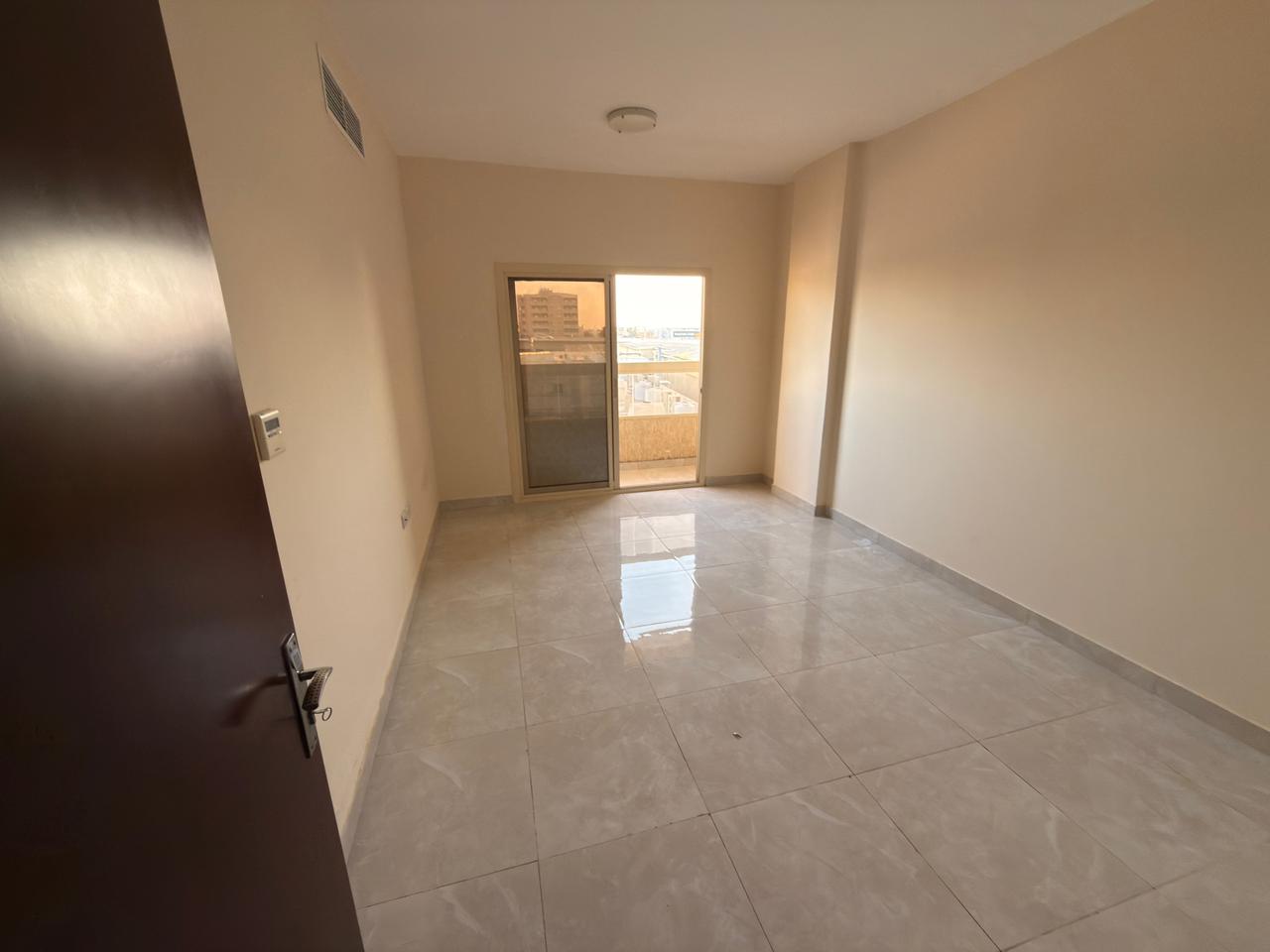 Two-bedroom apartment with a living room in Al Jurf 2, opposite Nesto Market – 2 bathrooms and a balcony, 40,000 AED in 6 installments, located near t