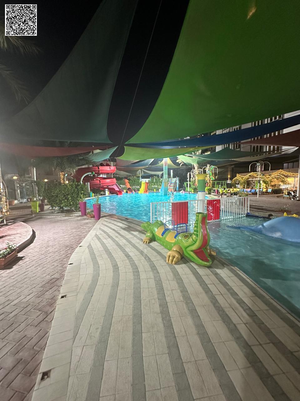 1BR + hall apartment in Al Rashidiya with gym, pool & waterpark. Master bedroom, central gas & AC, free month, built-in wardrobes, balcony.