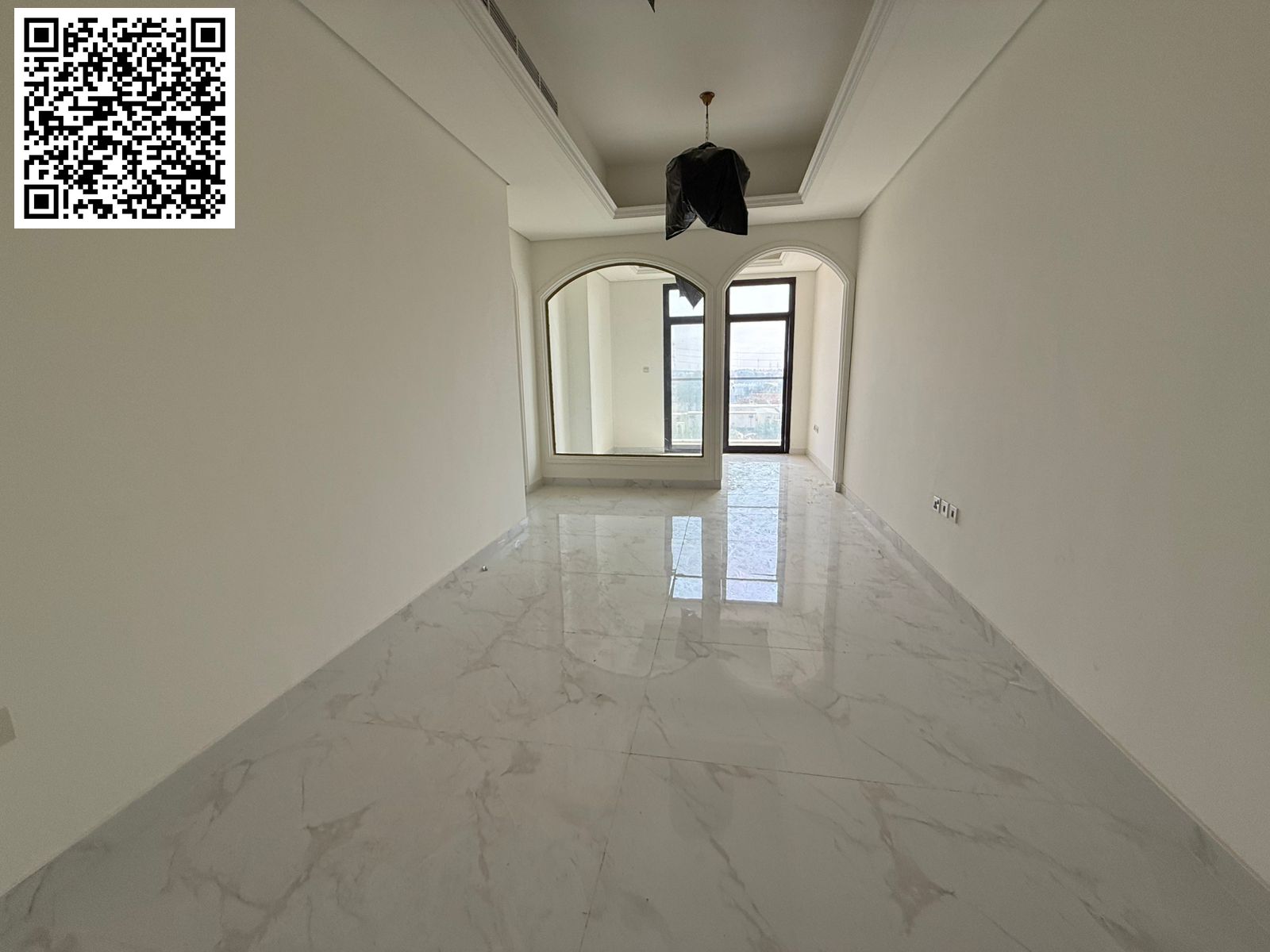 Brand new 3-bedroom apartment with living room and majlis in Al Tallah 2, Ajman. Features include 3 bathrooms, balcony, central air conditioning, swim