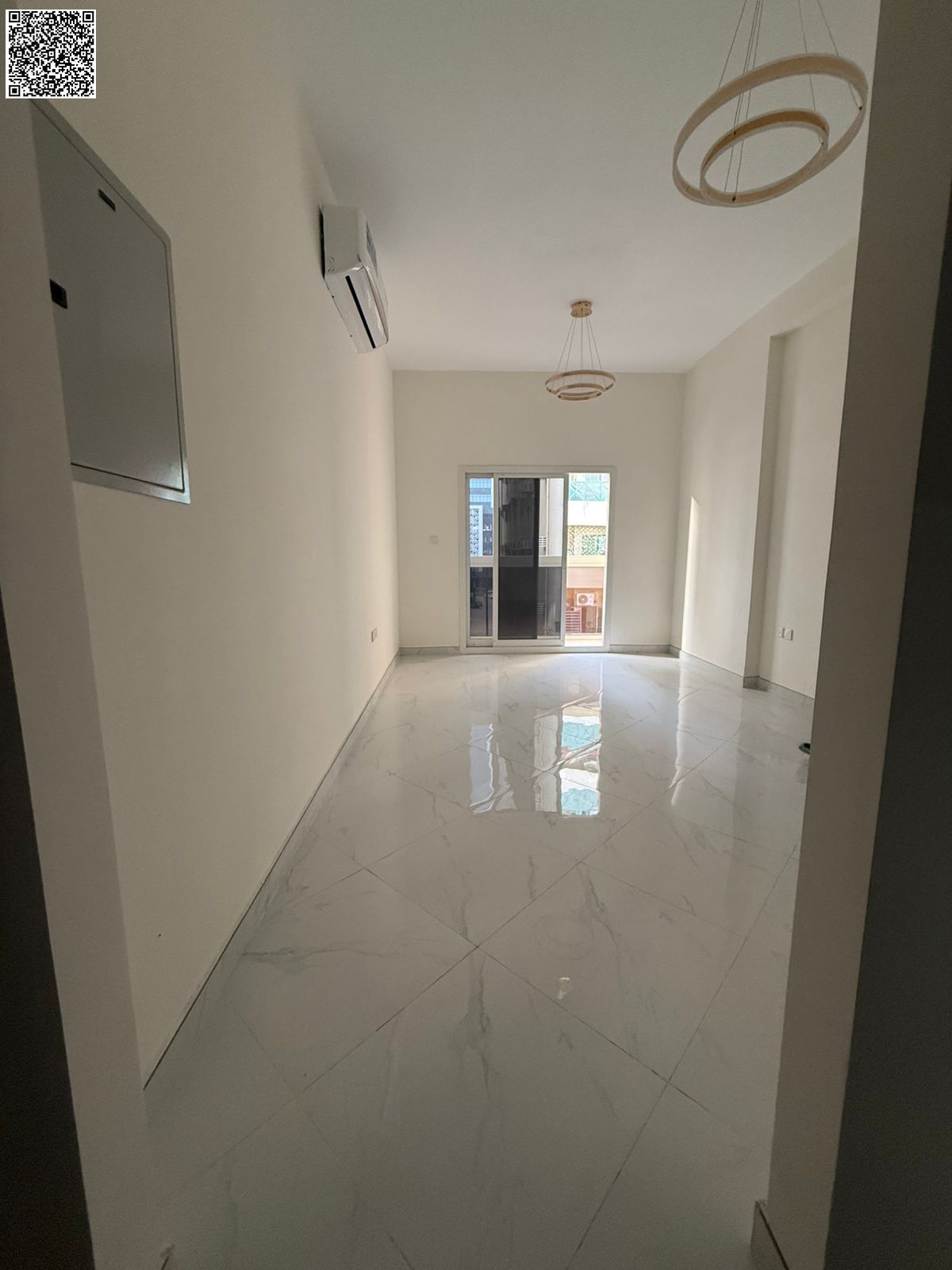 Brand-new first-tenant 2BR + hall in Al Nuaimiya, prime location near Day To Day & Khalifa St. 3 baths, balcony, great finish.