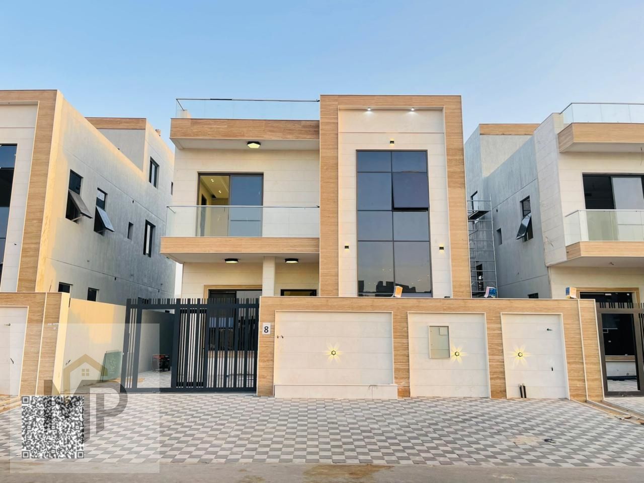 For sale: A distinctive villa in Al Yasmin area – two floors and a roof, including registration and ownership fees.