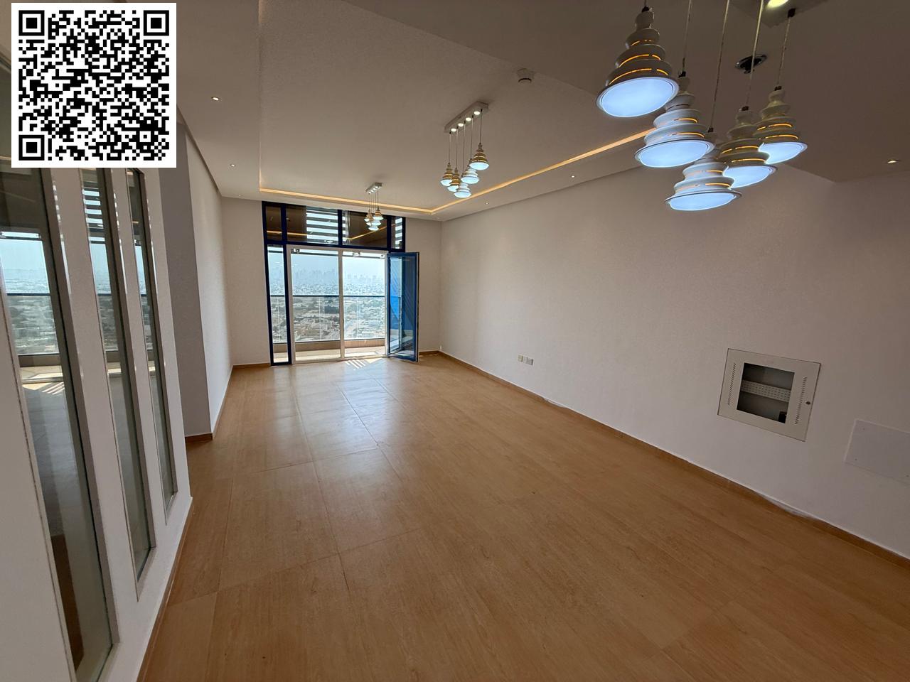 3-bedroom apartment with a living room for annual rent in Al Nuaimiya 3, Ajman. 2 bathrooms, balcony, luxury hotel-style finishes, free parking, AED 6