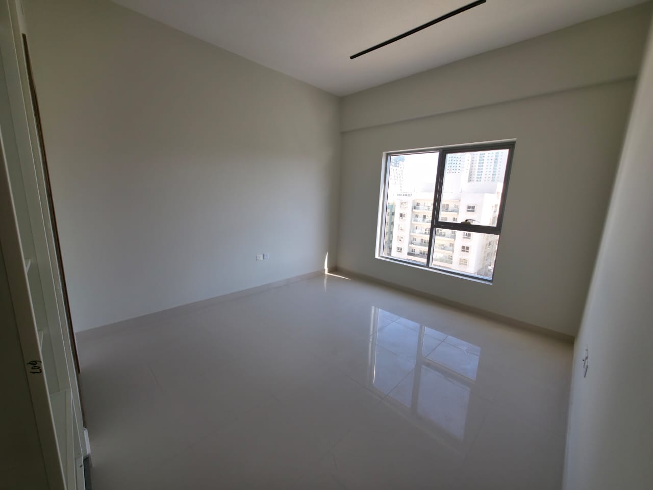 New apartment — first tenant — three bedrooms and a living room in Al Nuaimiya, close to Al Hikmah School and next to Royal Furniture, on the exit to