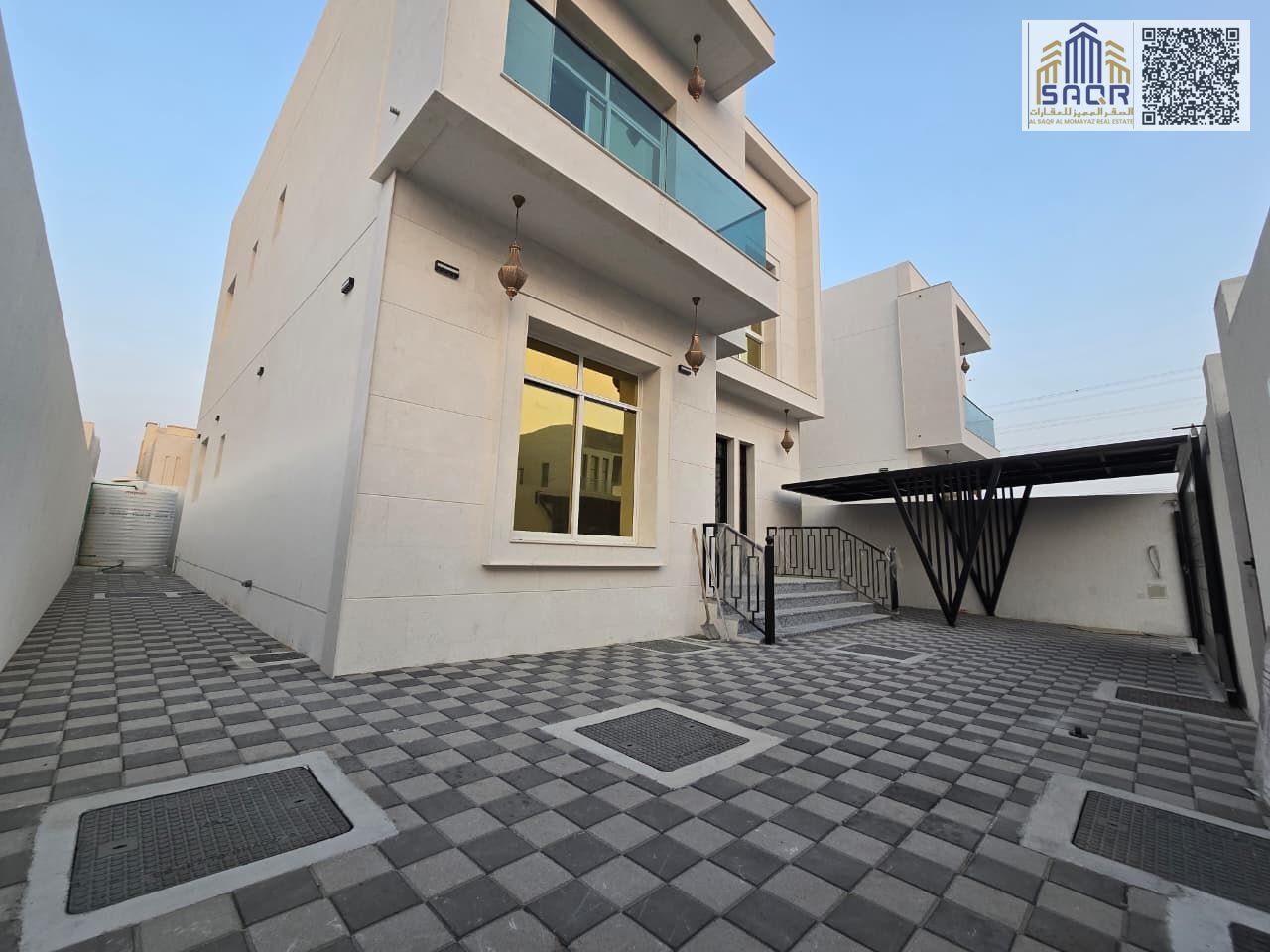 Spacious Luxury Residential Unit Featuring Four Bedrooms Two Living Halls and a Maid Room Designed for Comfortable Family Living