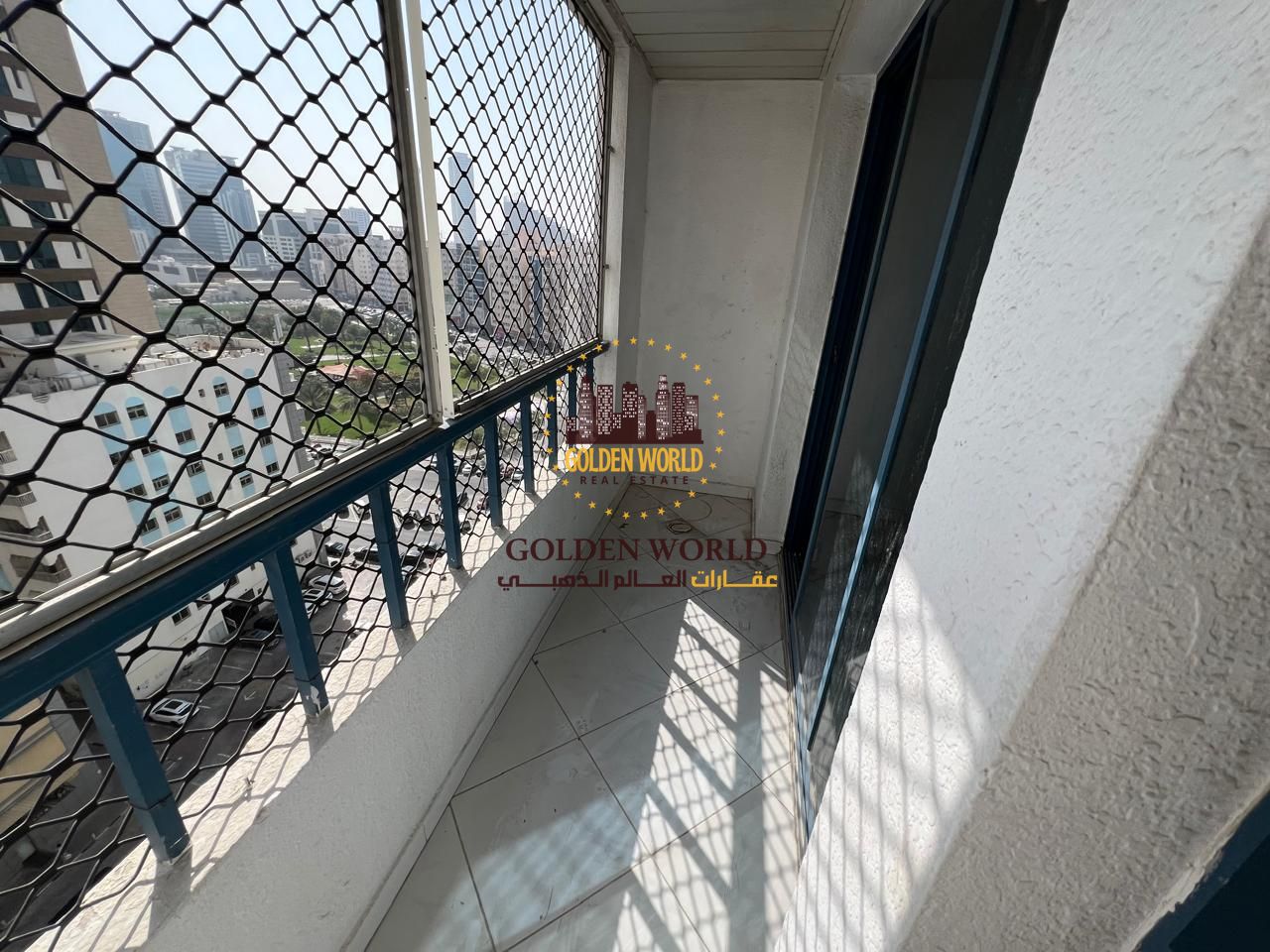 Three-bedroom apartment with living area in Al Majaz 3, spacious layout, bright open view, master bedroom and dual-access balcony