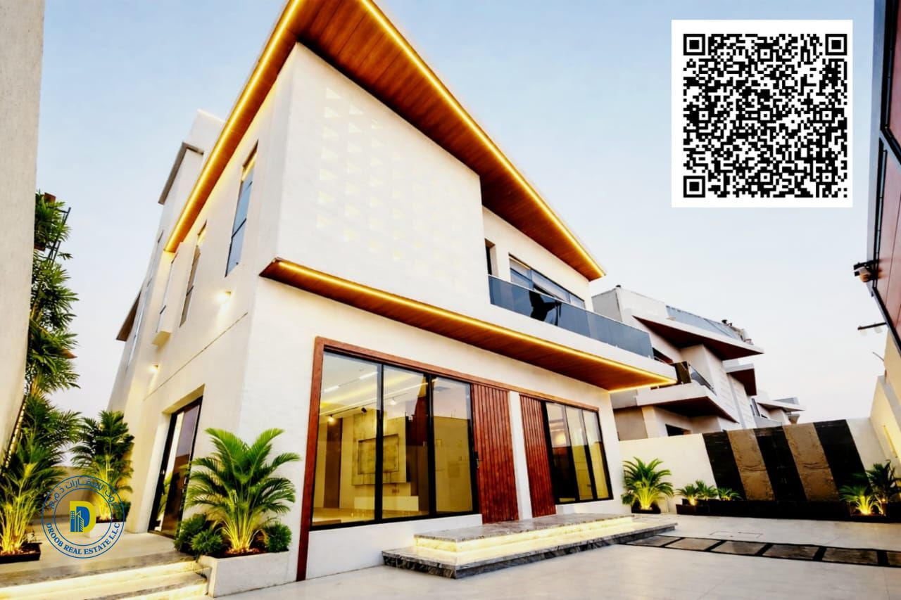 The price includes registration fees for a 5-bedroom villa with a large roof terrace in Al Haliyo 2, Ajman, at an excellent price.