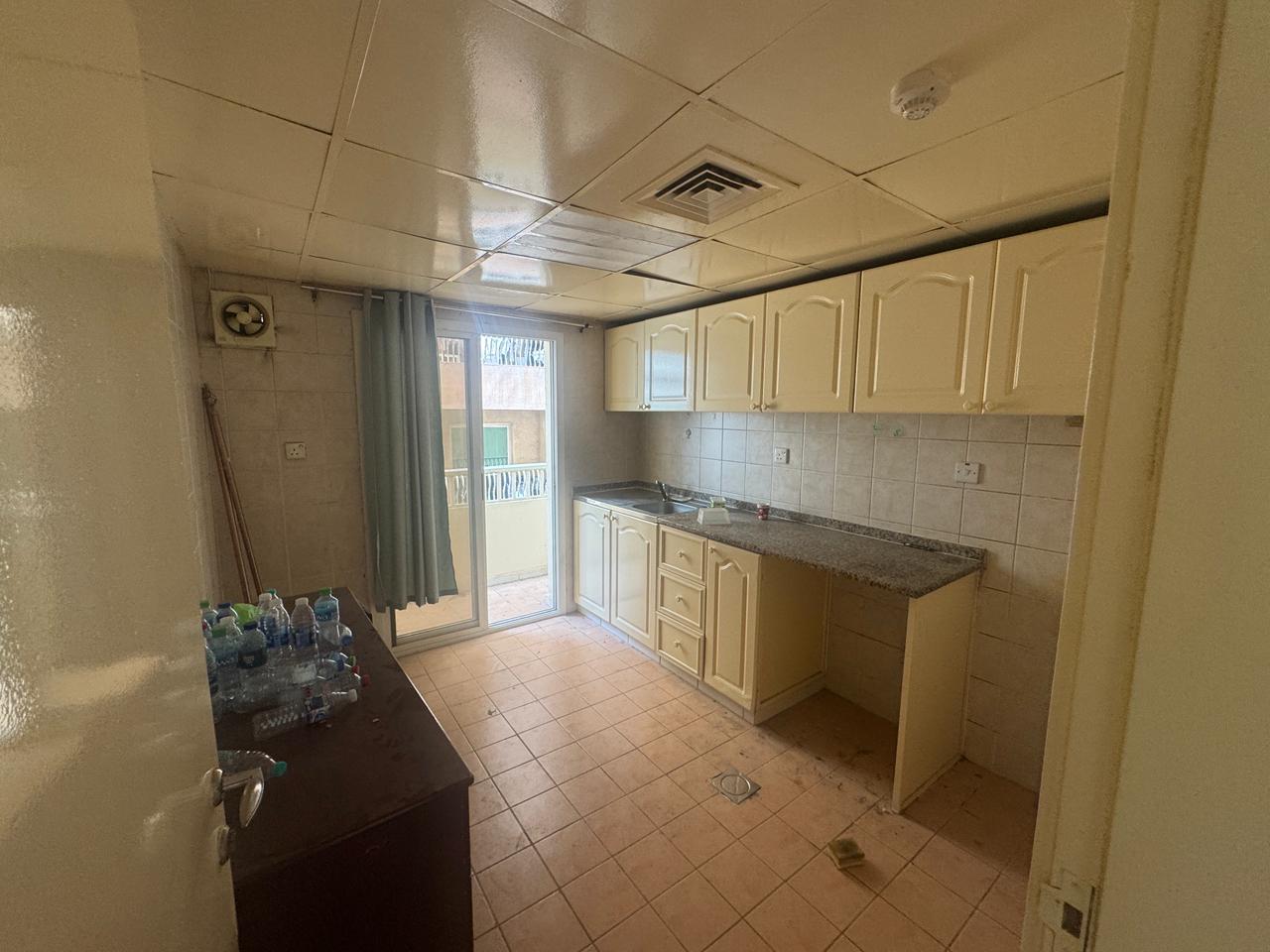 1 bedroom apartment with hall, kitchen balcony and 1 bathroom, close to Dubai exit and services, flexible payment, rent AED 39,000