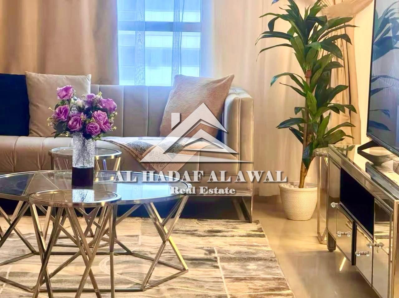 A distinctive apartment for monthly rent in Al Qasba - Beach 2, located within a prestigious residential tower with a direct sea view. Rent AED 70000