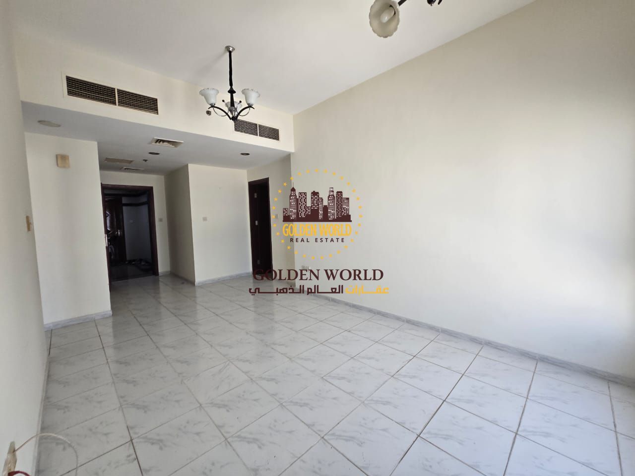 Two-bedroom apartment in Al Majaz 2 without balcony, master room, 3 bathrooms, open view, close to Dubai exit and services, rent AED 40,000