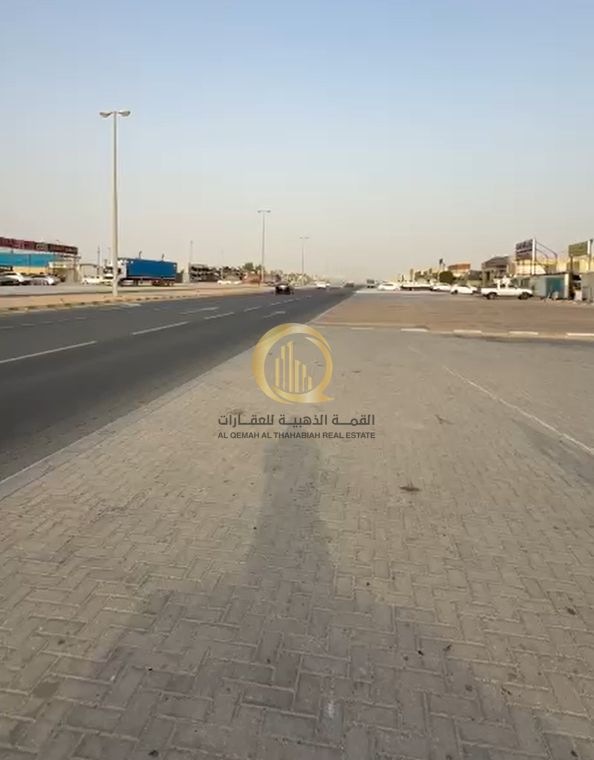 For sale: a plot in the industrial area of Sharjah, Al-Sajaa, on a main street opposite the scrap yard. Area: 21,500 sq. ft. Freehold ownership fo
