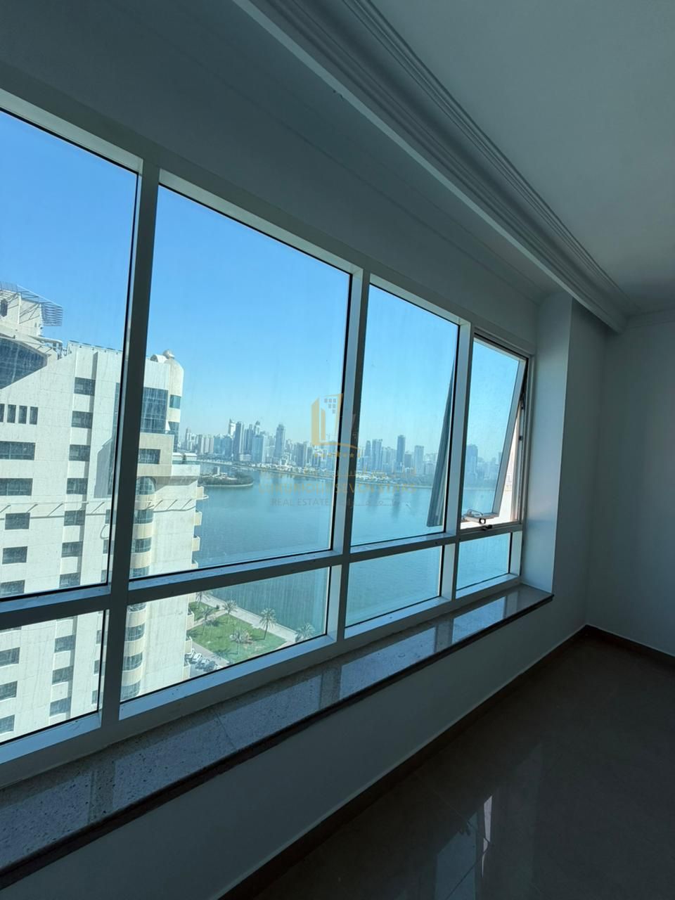 For Sale Distinctive Apartment in Al Muhannad Tower with a Direct View of Khalid Lagoon – Al Majaz Area