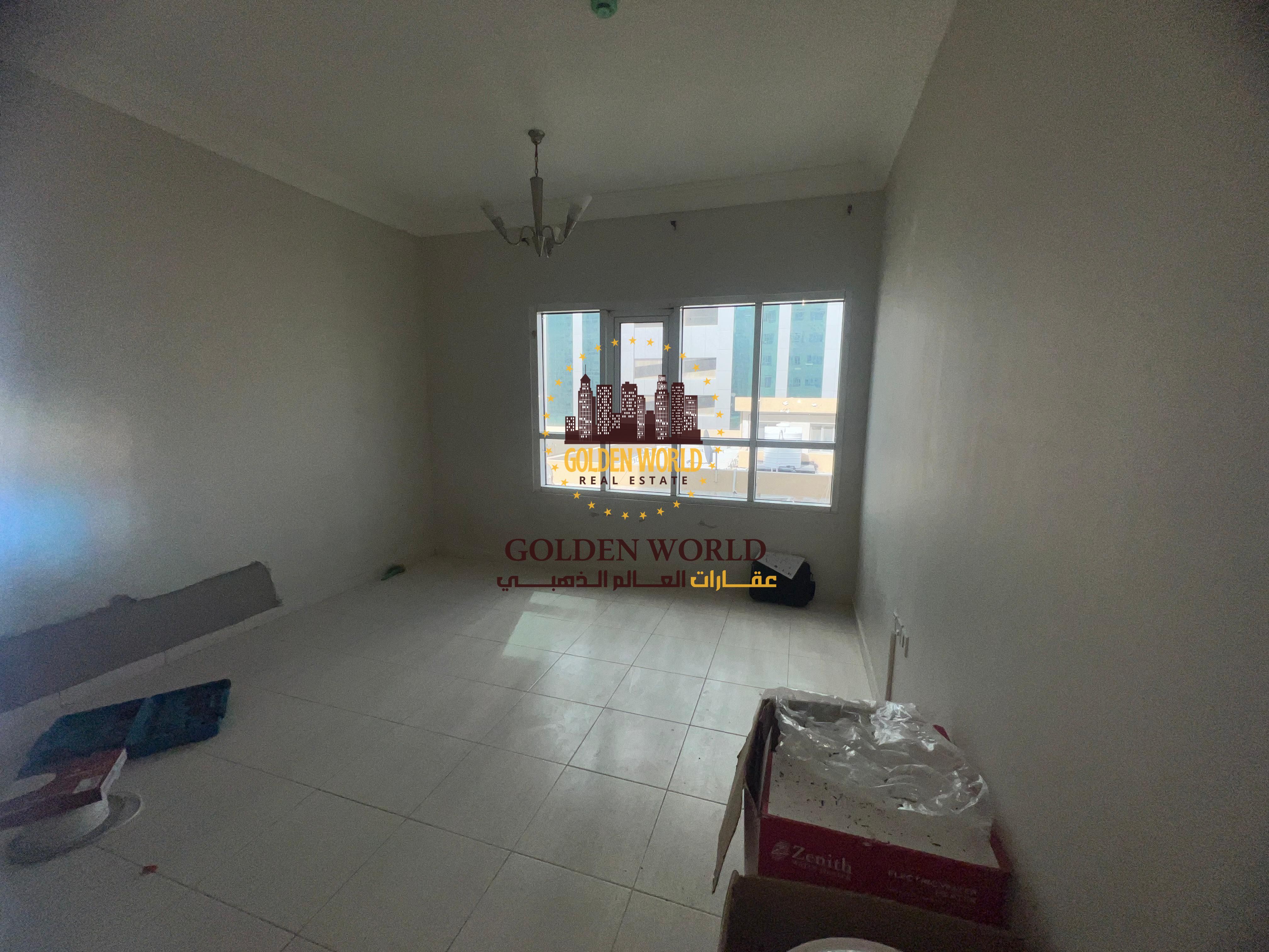 2-bedroom apartment with living room in Al Majaz 1, Sharjah. Side view, 2 bathrooms, free maintenance, central gas, 24/7 security, family-only. 42,000
