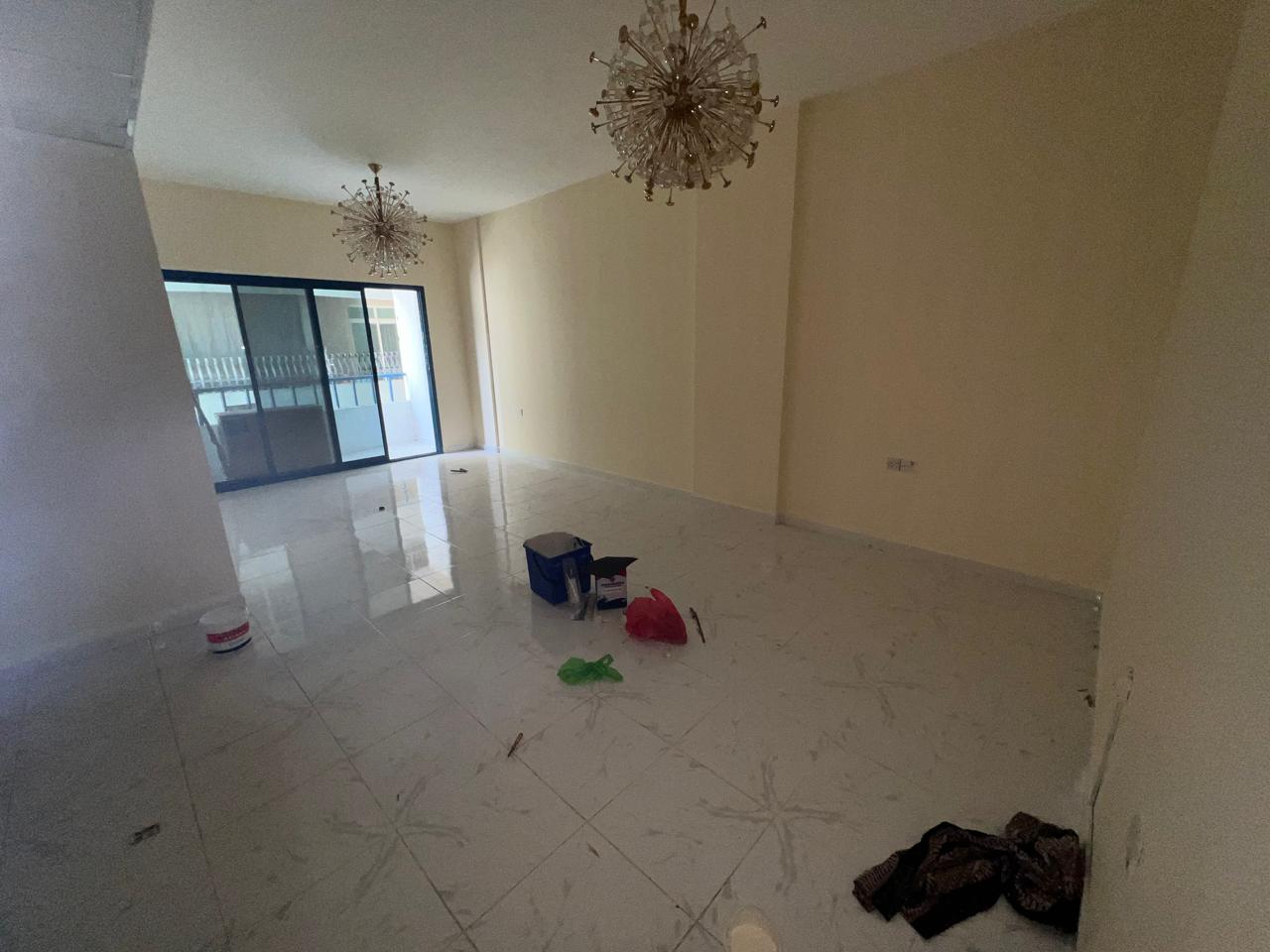 2BR apartment in Al Majaz 3 with balcony, partial view, open-view bedroom, built-in wardrobes, two bathrooms, near Dubai exit, rent AED 50,000