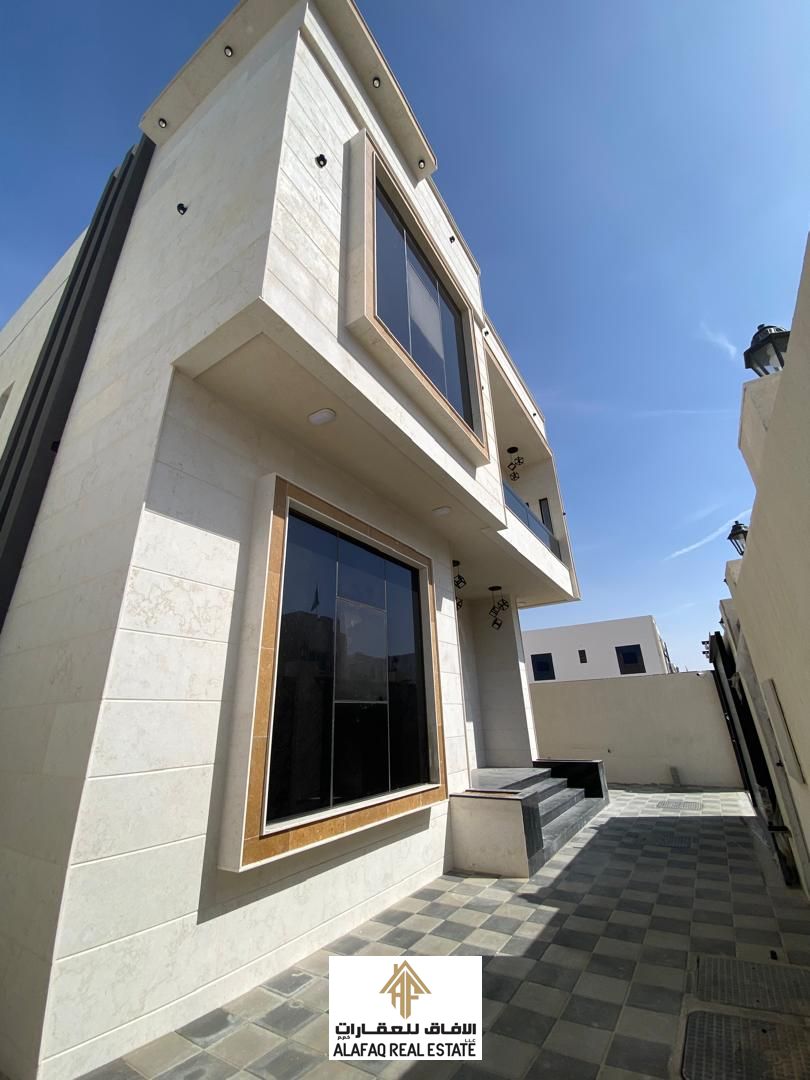 Luxury villa for sale in Al Zahia with spacious areas, 5 master bedrooms, family living hall and majlis, maid’s room, high-end finishing, quiet locati