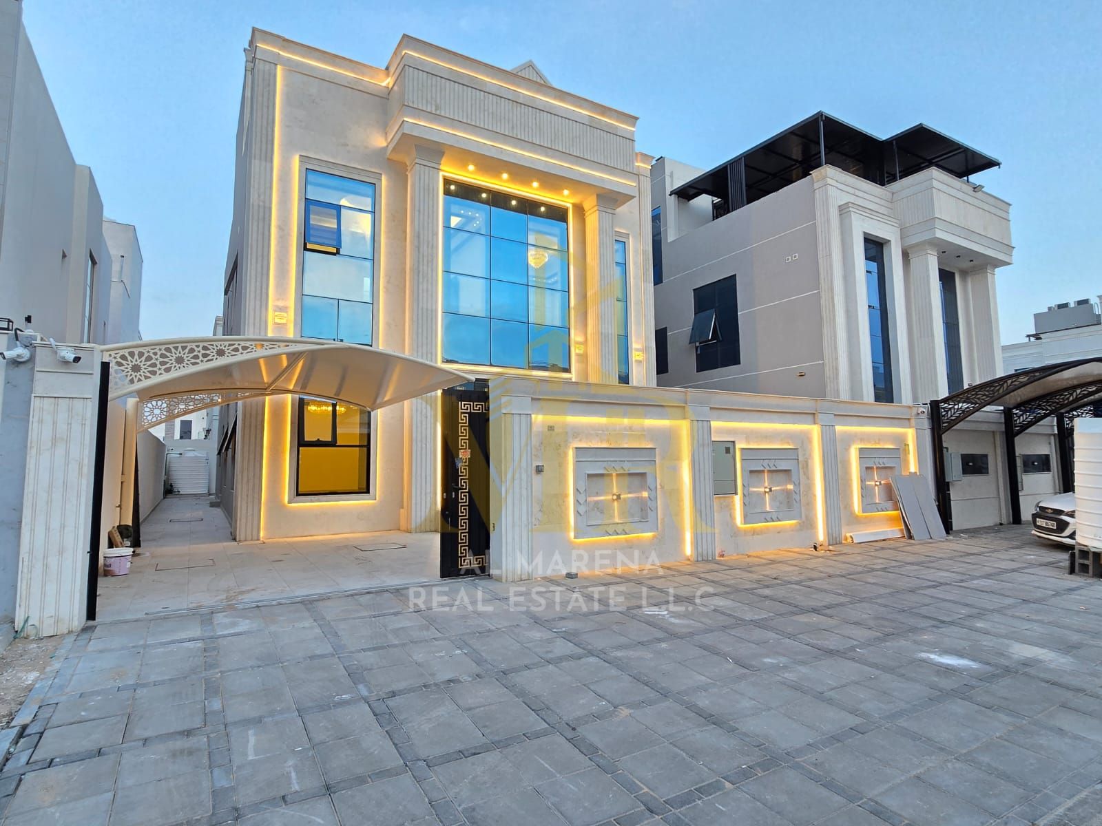 A villa for sale in Al Helio 2, Ajman, with all utilities (electricity, water, and air conditioning) included. Ready to move in, located on the main s