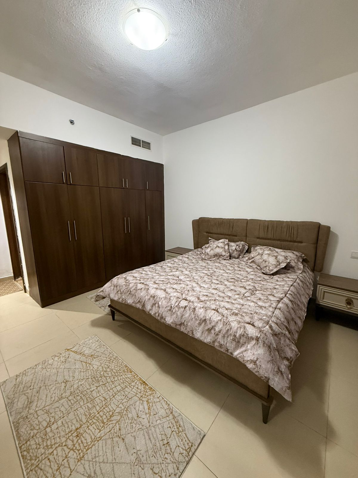 Luxury one bedroom and living room apartment with elegant modern furnishings offering exceptional comfort and privacy located in a prime location clos