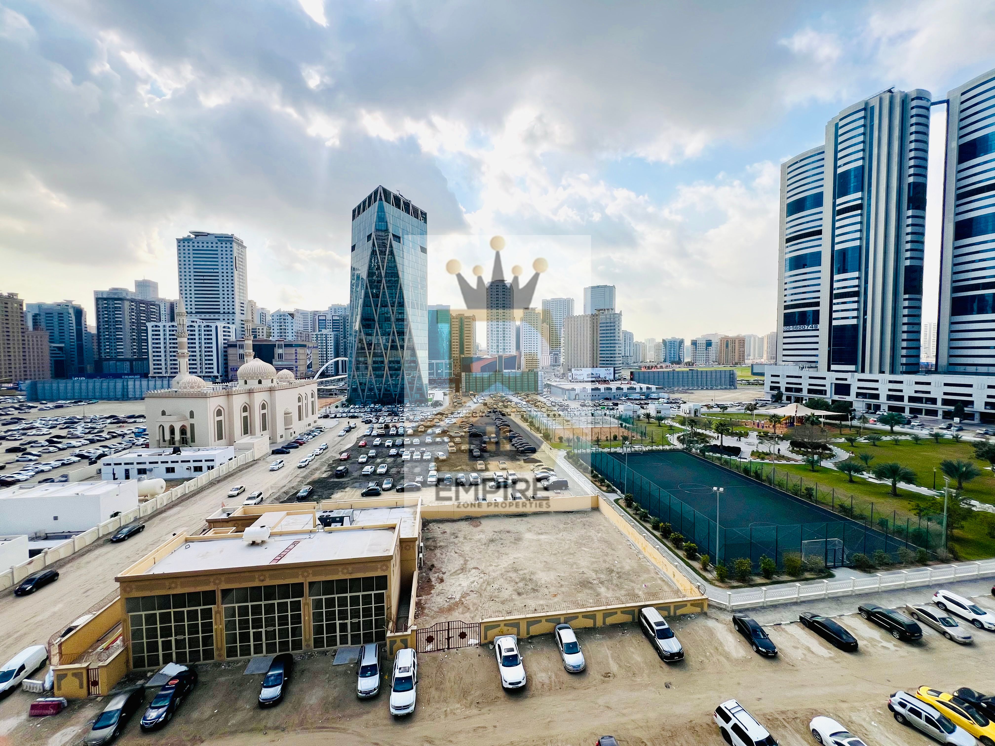 Brand-new building full open view to master with wardrobe with balcony one parking free exit to Dubai