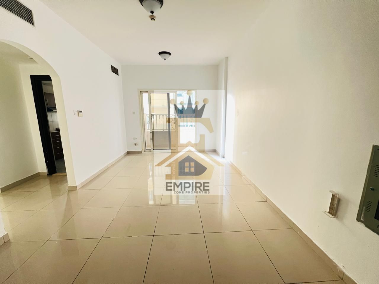 luxury living with balcony good finishing maintenance free also parking free Prime location near close exit to dubai