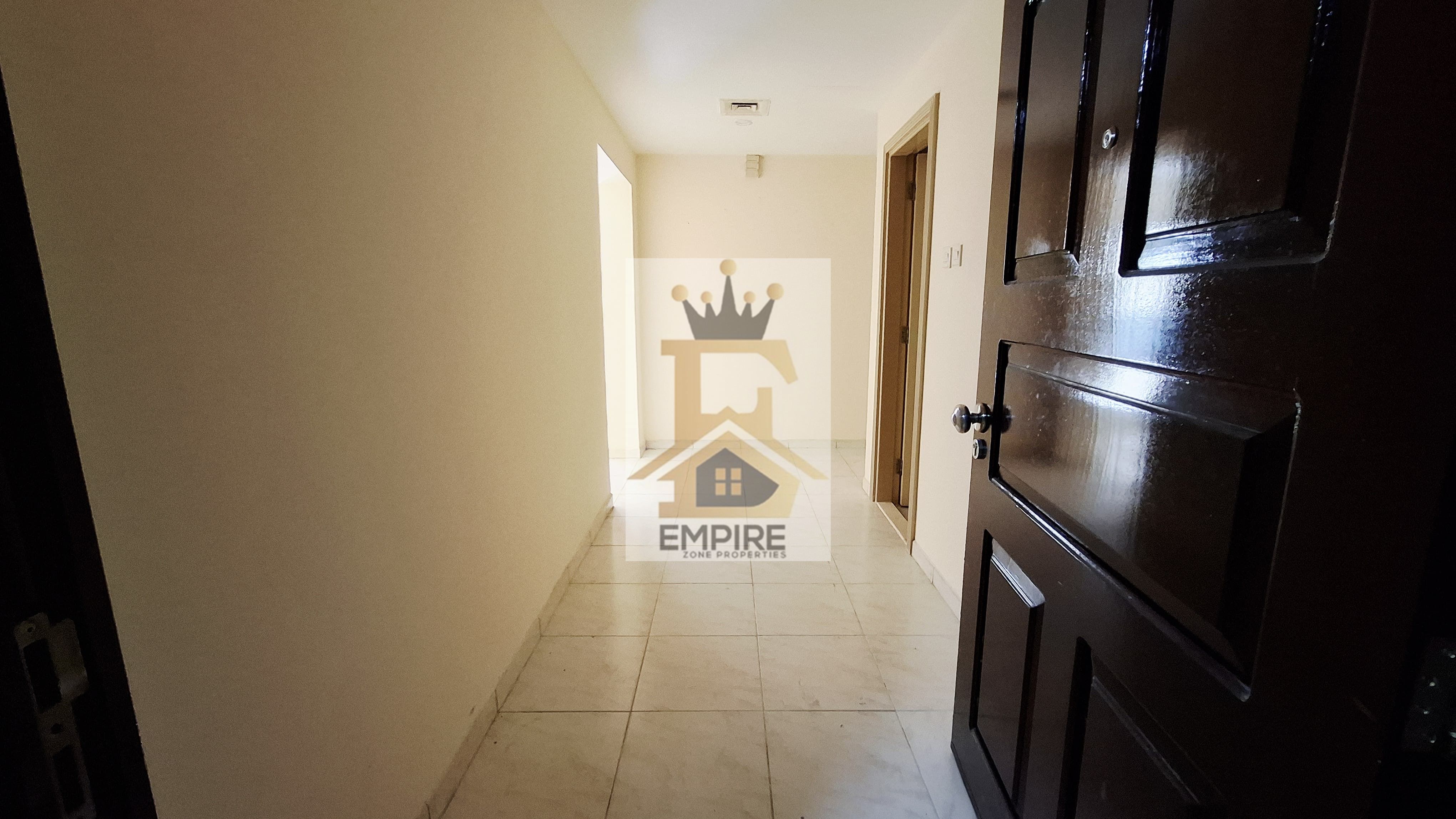 spacious living with open view big size hall balcony one parking free Maintenance free Prime location on main road building near close exit to dubai