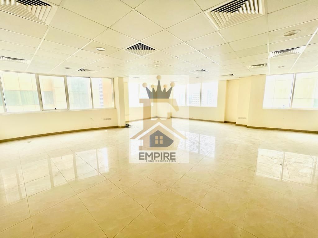 luxury office with good ceiling like ready to move washroom and store room also maintenance free Prime location on main road building near close exit to dubai