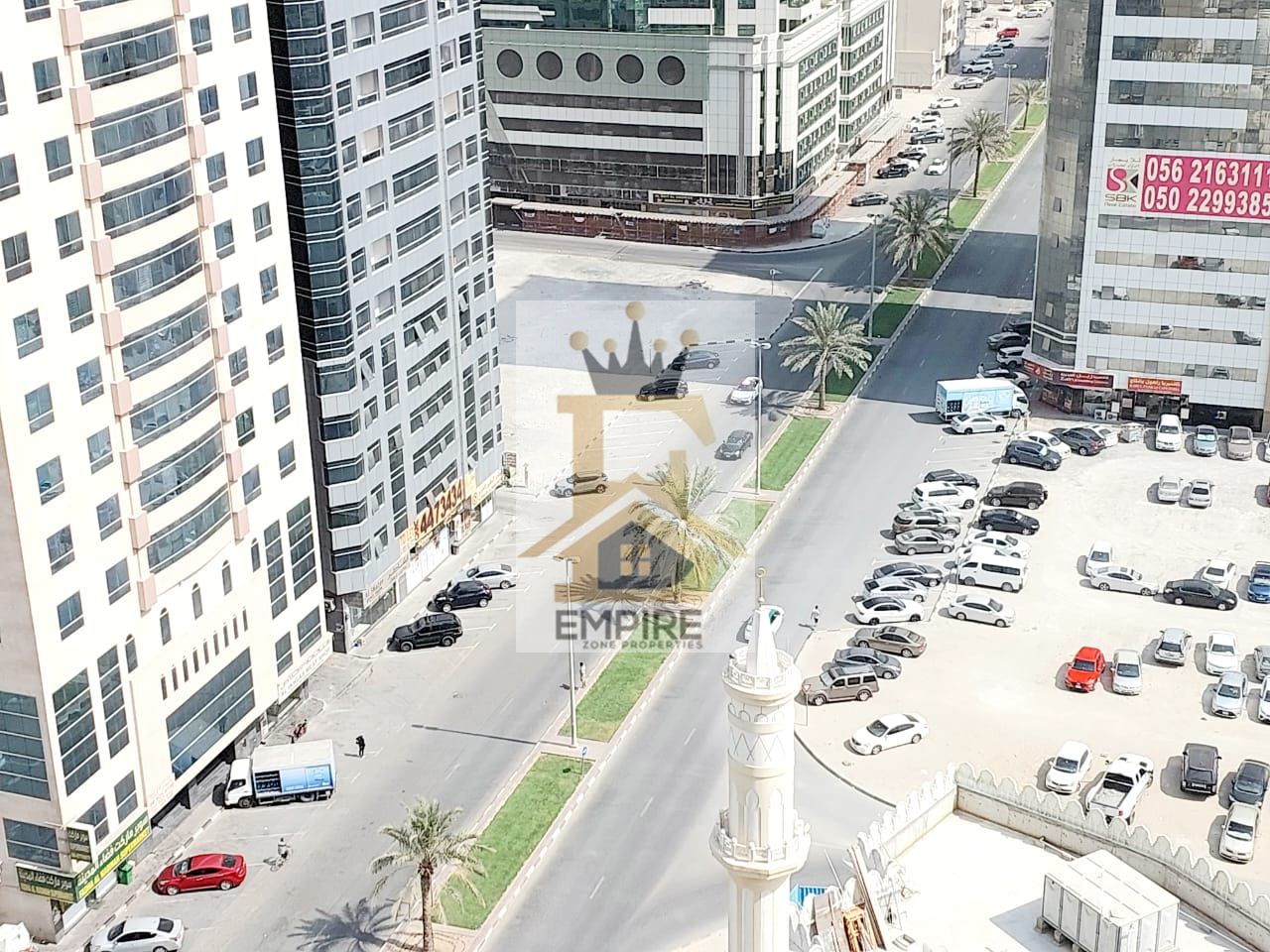 luxury living with open view balcony wardrobes good finishing gym&pool and maintenance free prime location on main road building near close exit to dubai