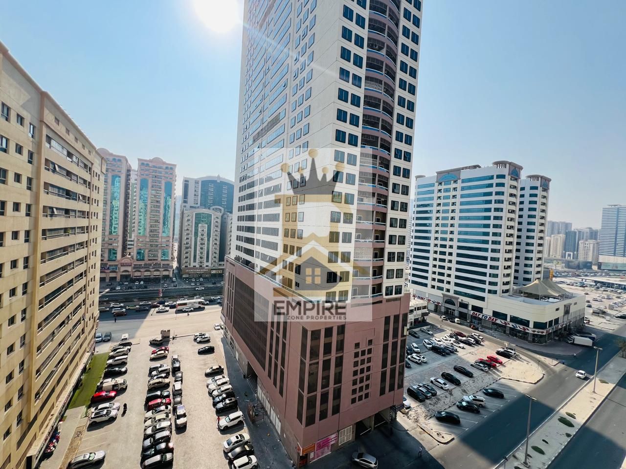 luxury living with balcony open view good finishing maintenance free also one parking free prime location near close exit to dubai