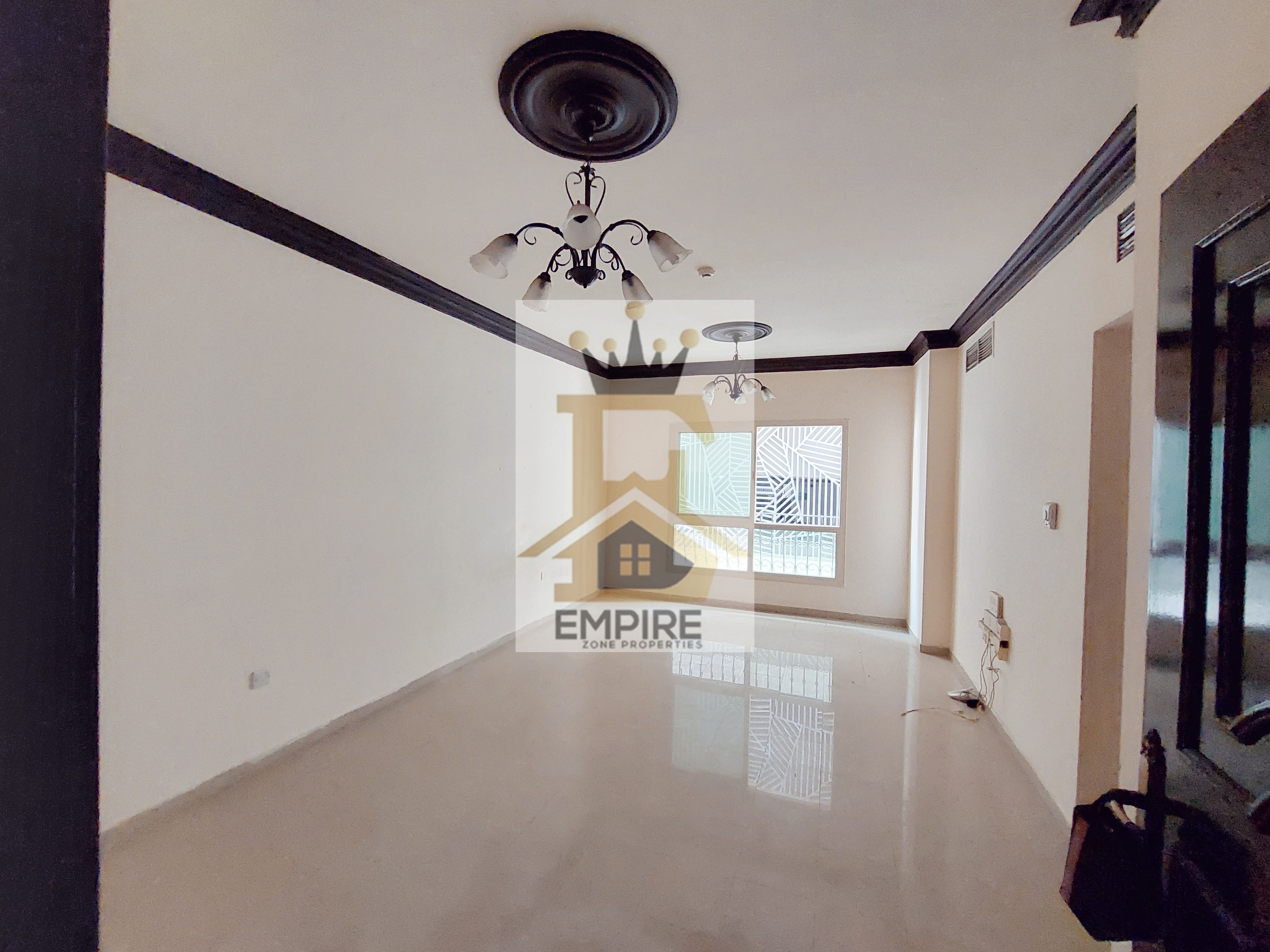 spacious living with open view wardrobes good finishing gym&pool and maintenance free prime location on main road building near close exit to dubai