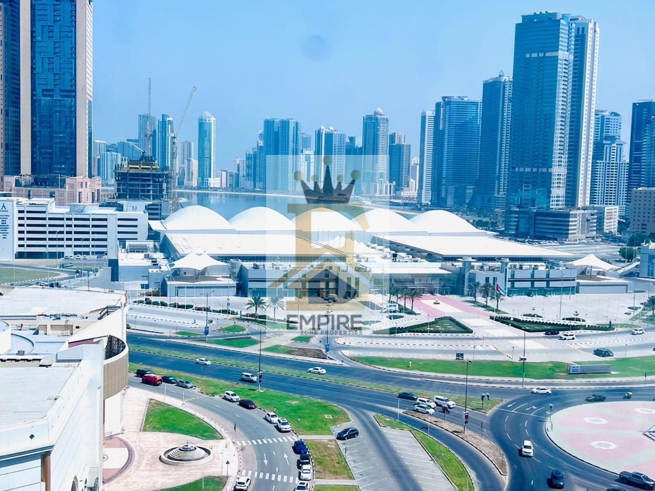 luxury living with open view wardrobes big windows gym&pool and maintenance free prime location on main road building near close exit to dubai