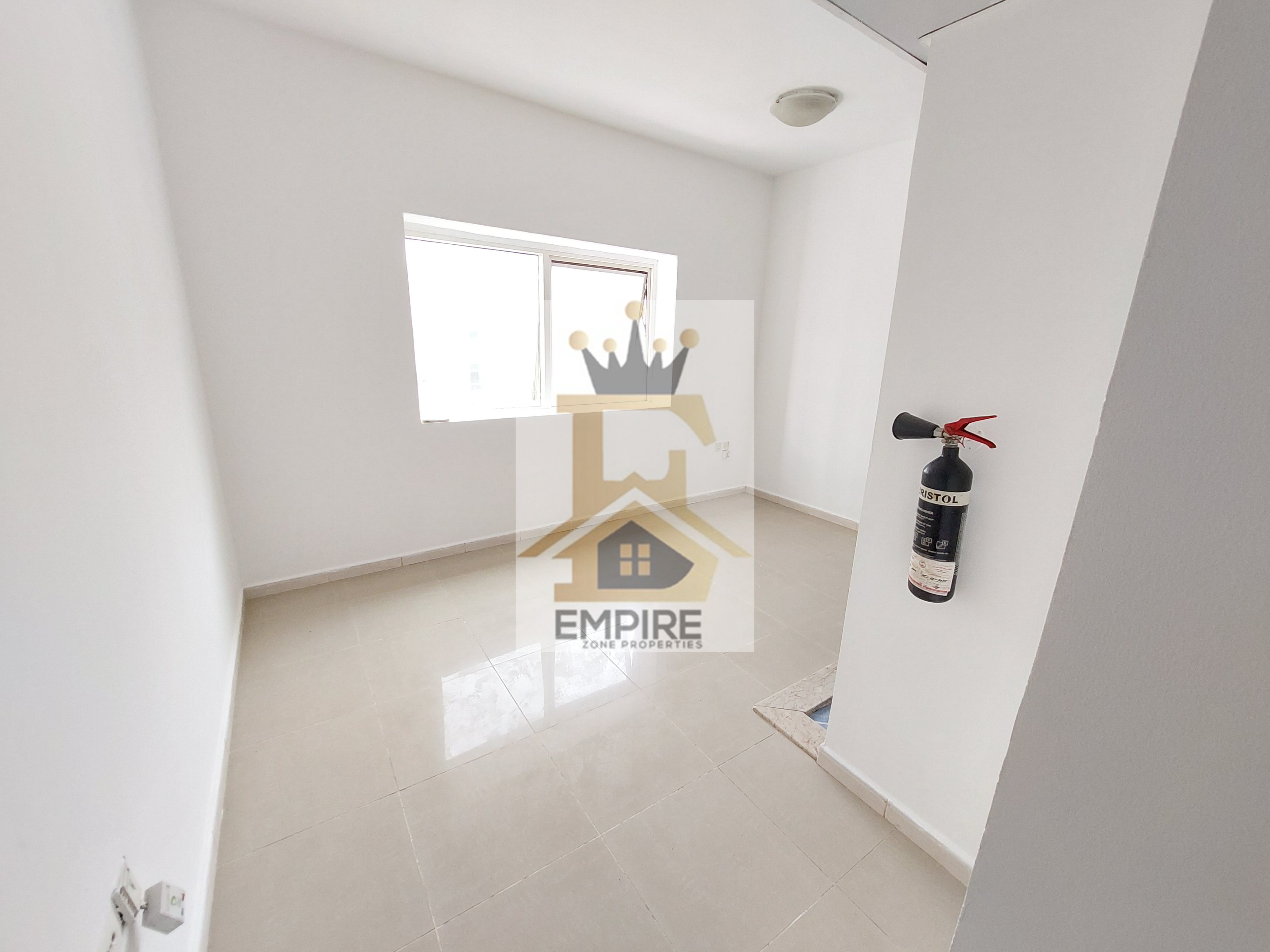 spacious living with open view good finishing gym and maintenance free prime location near close exit to dubai